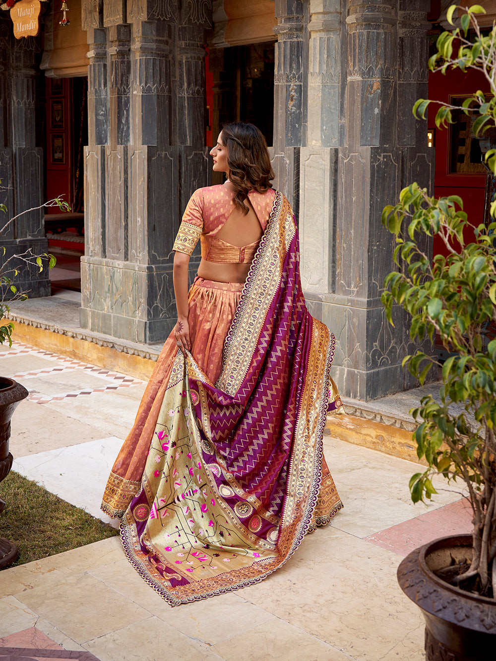 Peach shimmer organza lehenga choli with zari weaving paithani dupatta purse