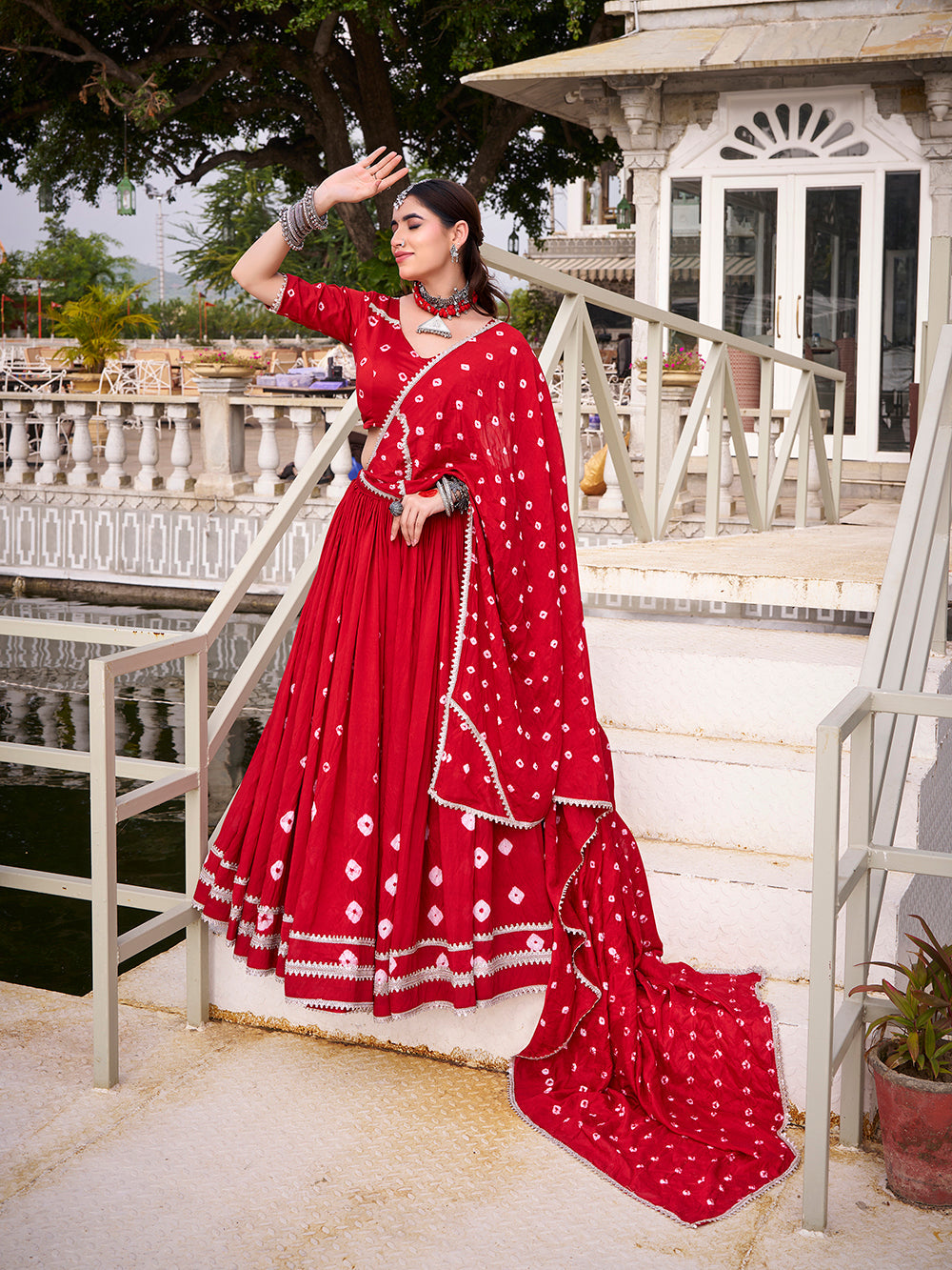 Red chanderi bandhej print chaniya choli with lace detailing 6 meter flair