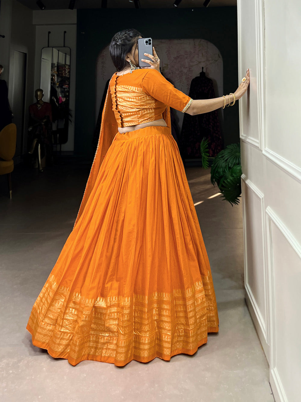 Vibrant orange chanderi silk lehenga choli with zari weaving matching dupatta