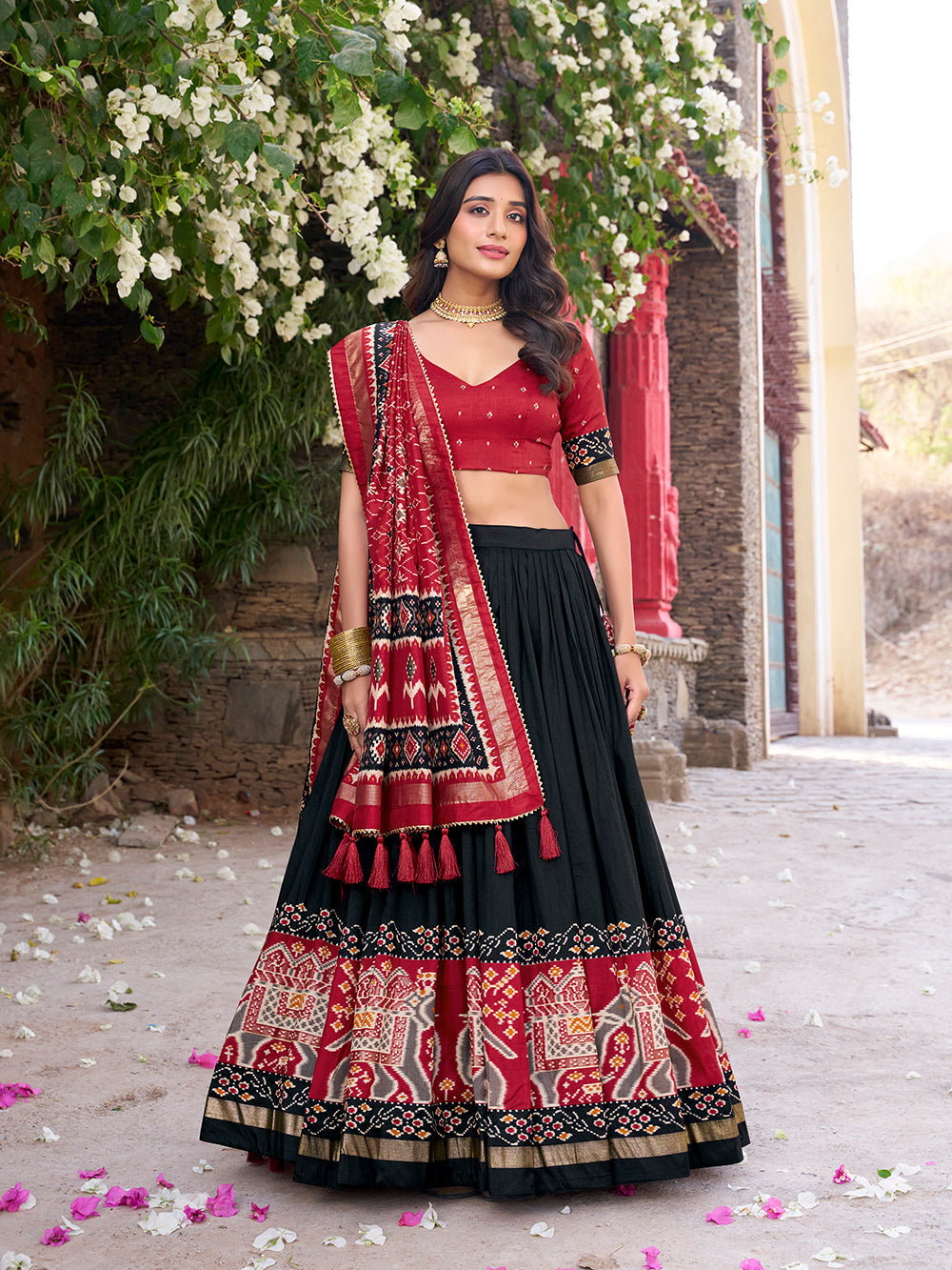 Midnight black tasar silk lehenga choli with patola print foil work