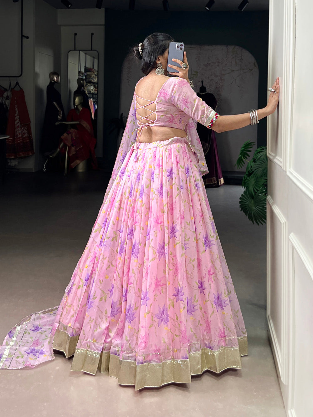 Baby pink tubby silk floral printed lehenga choli with mirror work embossed lace detailing