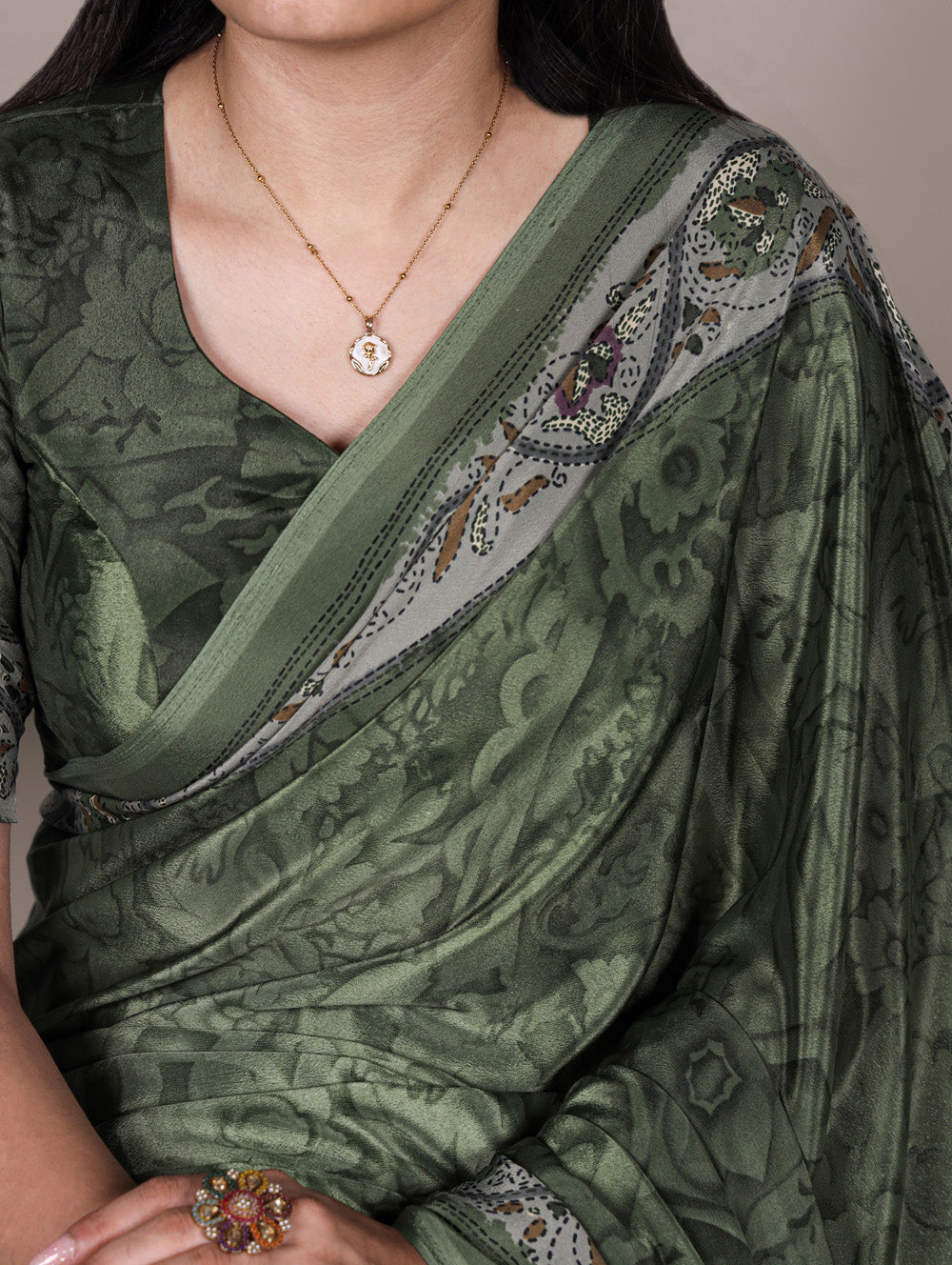 Mehendi color crepe saree with all over print matching blouse