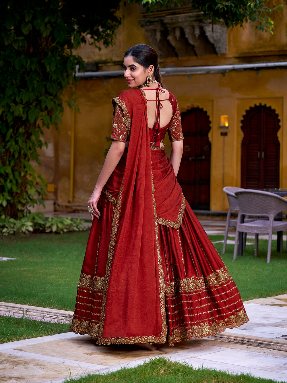Rust orange color sequins and thread embroidery work rangoli crush lehenga choli