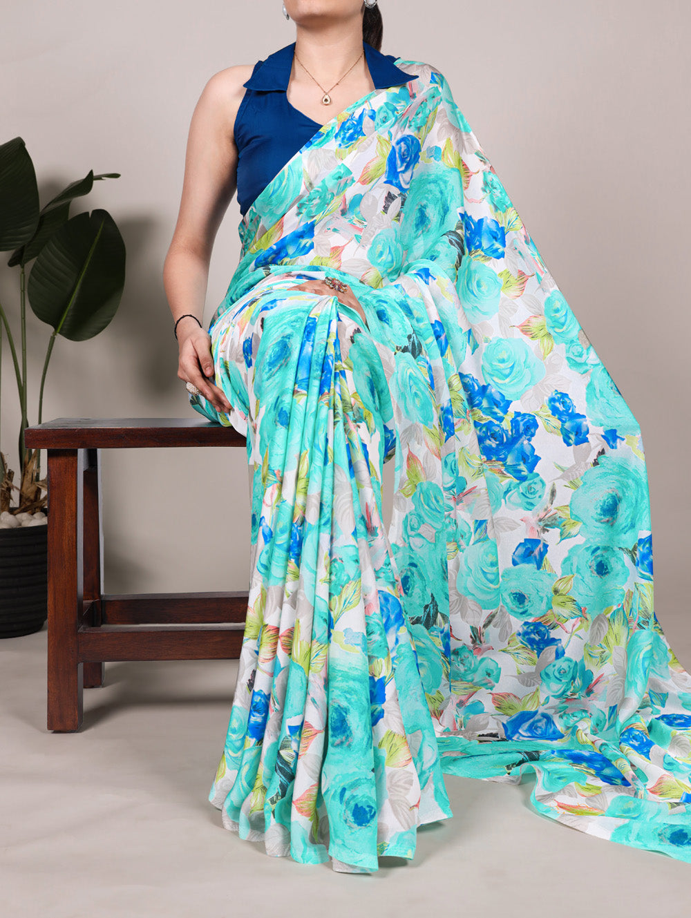 Firozi dull satin floral printed saree with matching blouse and pearl lace border