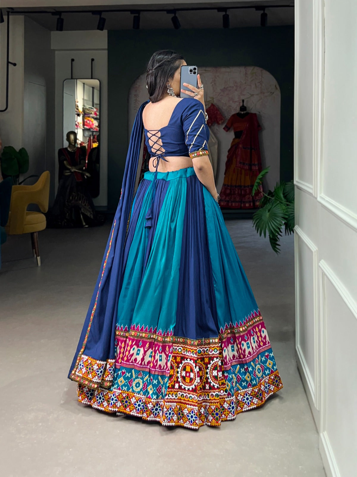 Firozi Vibrant Printed Silk Lehenga with Gamthi & Mirror Work