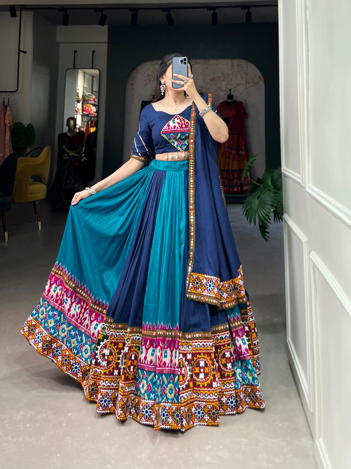 Firozi Vibrant Printed Silk Lehenga with Gamthi & Mirror Work