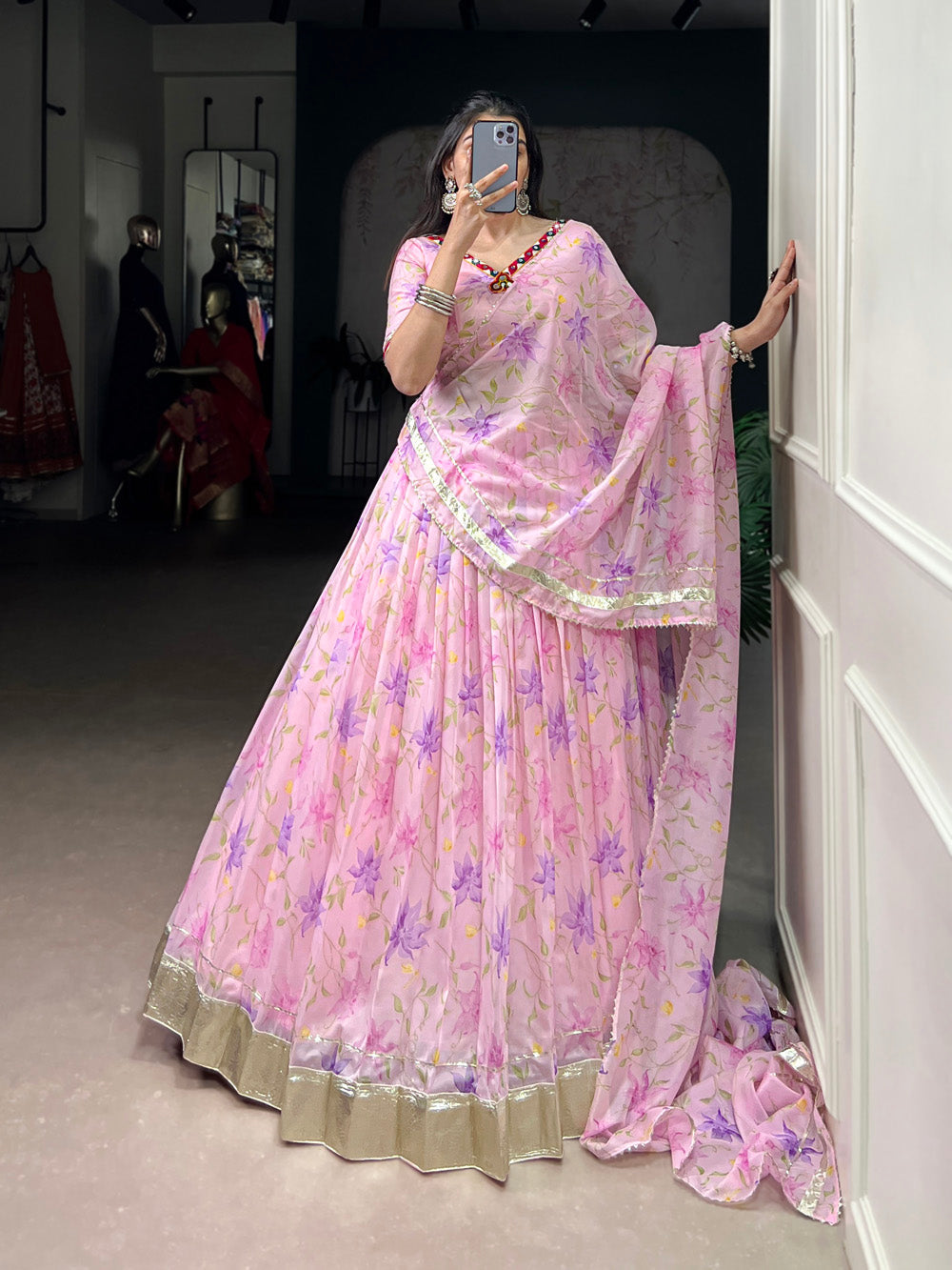 Baby pink tubby silk floral printed lehenga choli with mirror work embossed lace detailing