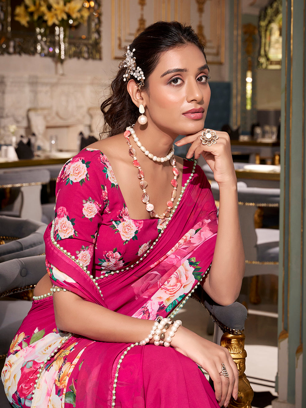 Pink georgette plain saree with printed pearl lace border