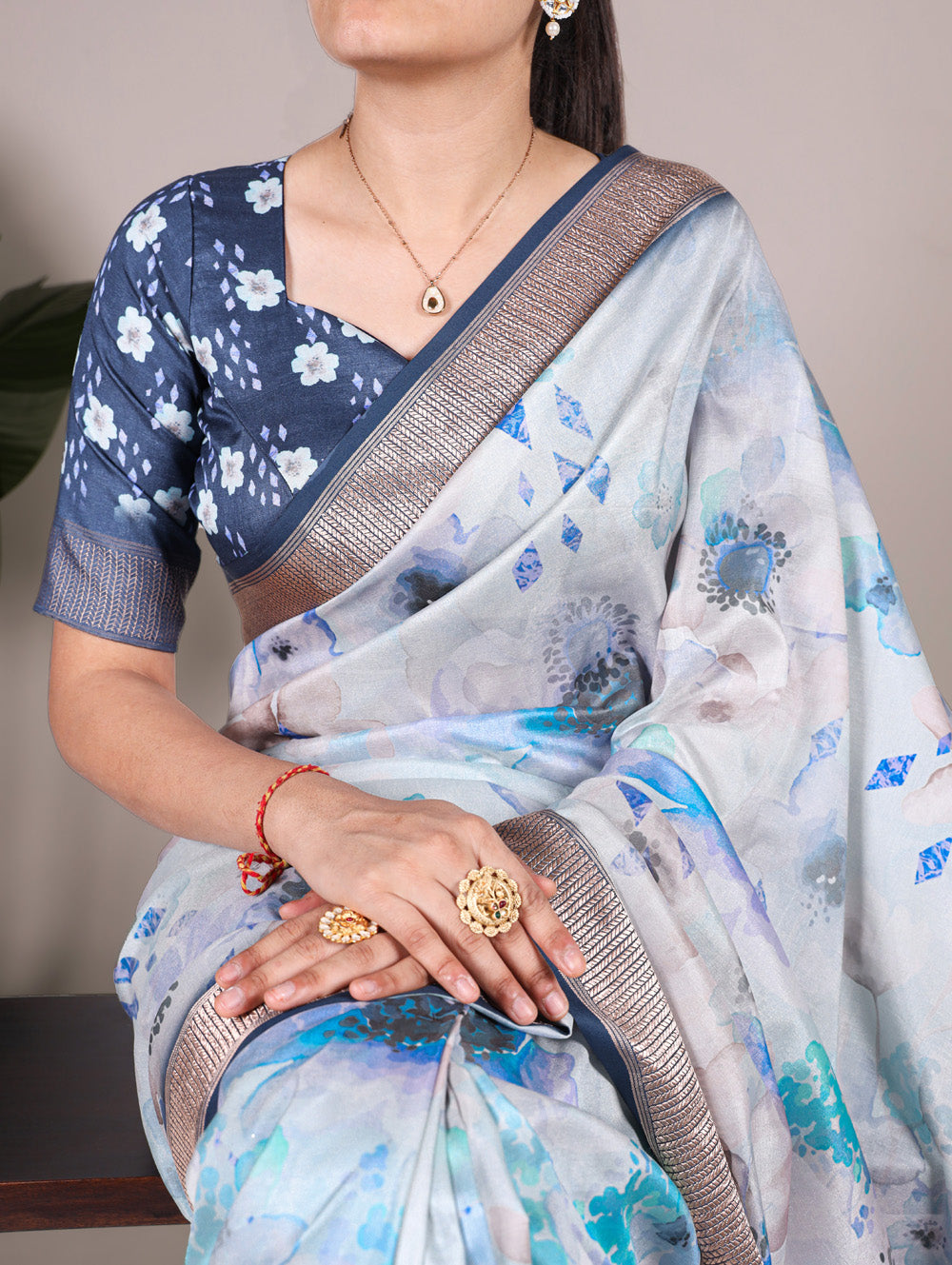 Sky blue tussar silk floral printed saree with viscose border blue blouse