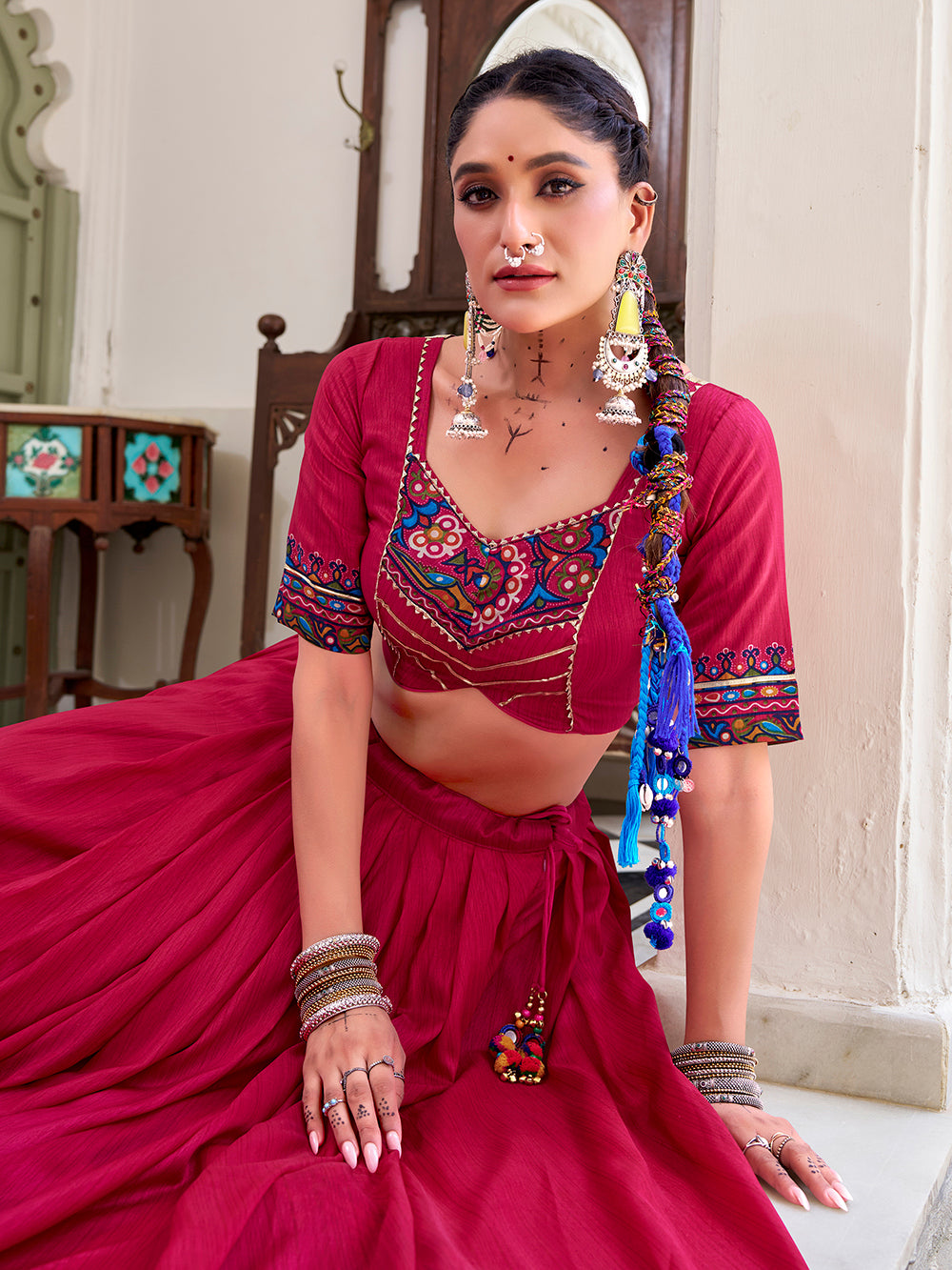 Pink tasar silk gamthi print lehenga choli with embossed design gotta patti work