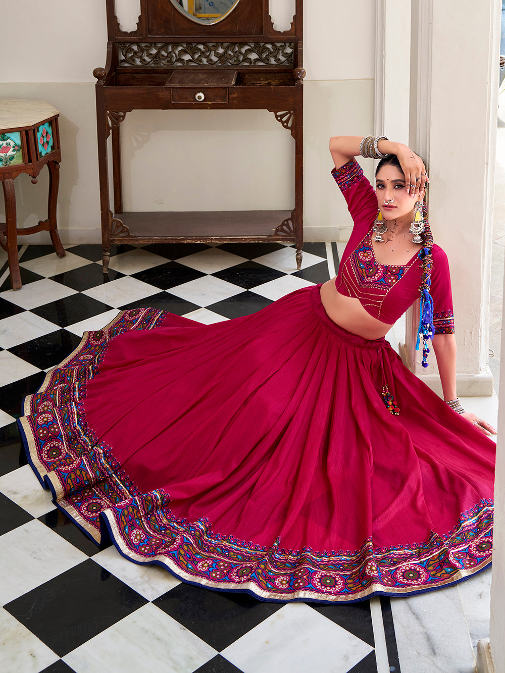 Pink tasar silk gamthi print lehenga choli with embossed design gotta patti work
