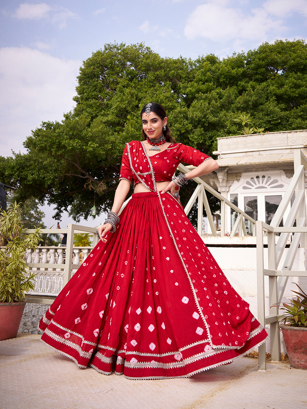 Red chanderi bandhej print chaniya choli with lace detailing 6 meter flair