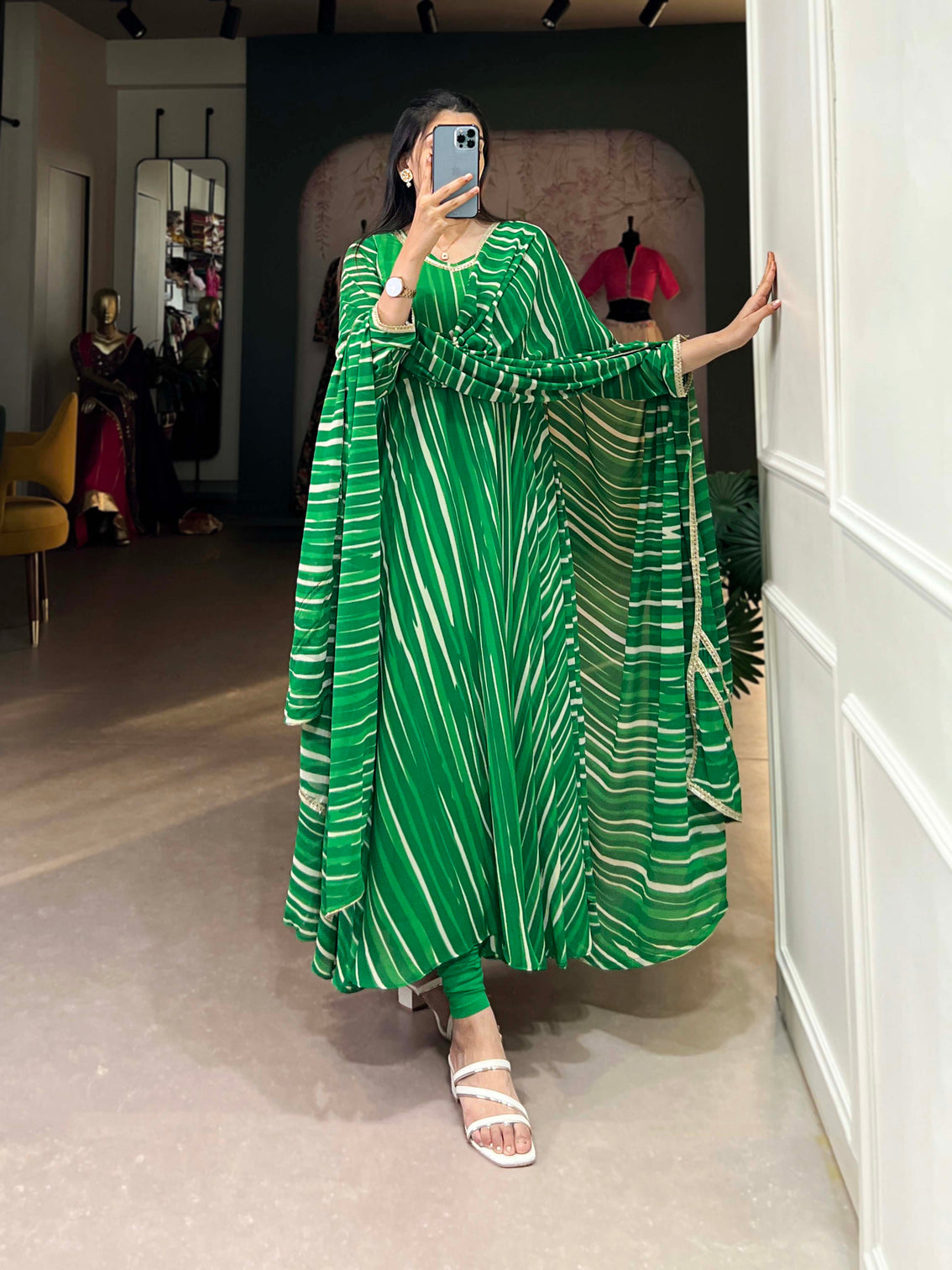 Green color leheriya with lace touch up georgette gown