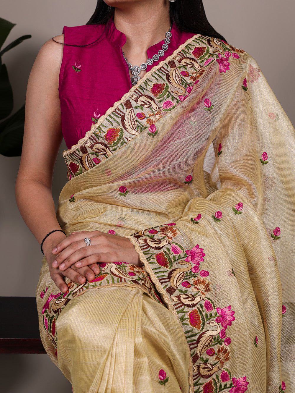 Gold zari kota tissue saree with floral thread embroidery and banglory blouse fabric