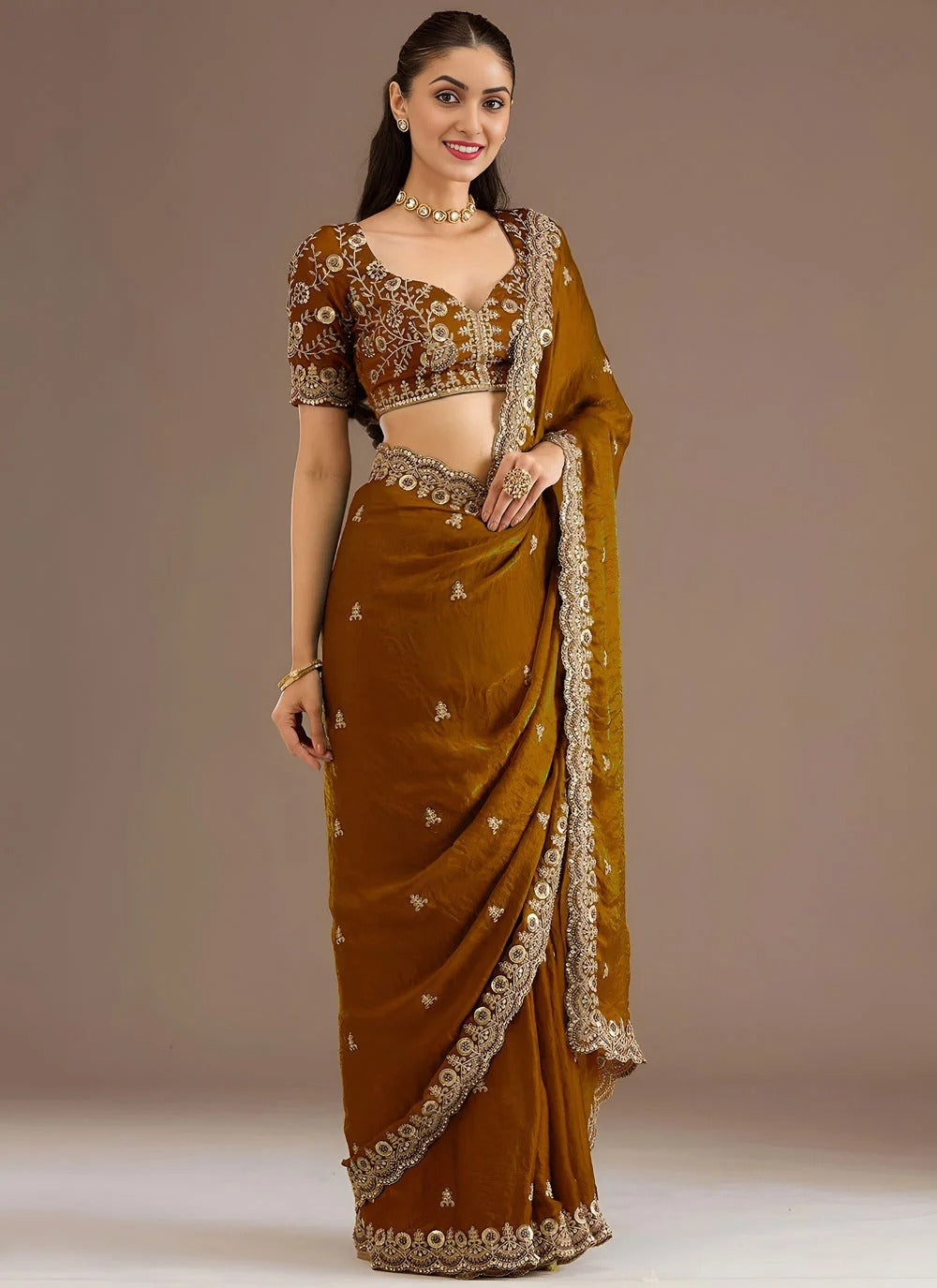 Regal golden tissue silk saree with zari dori sequins embroidery