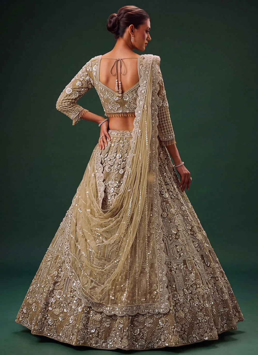 Golden bridal reception lehenga for bride with sequins dori embroidery