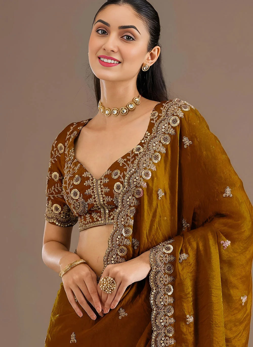 Regal golden tissue silk saree with zari dori sequins embroidery