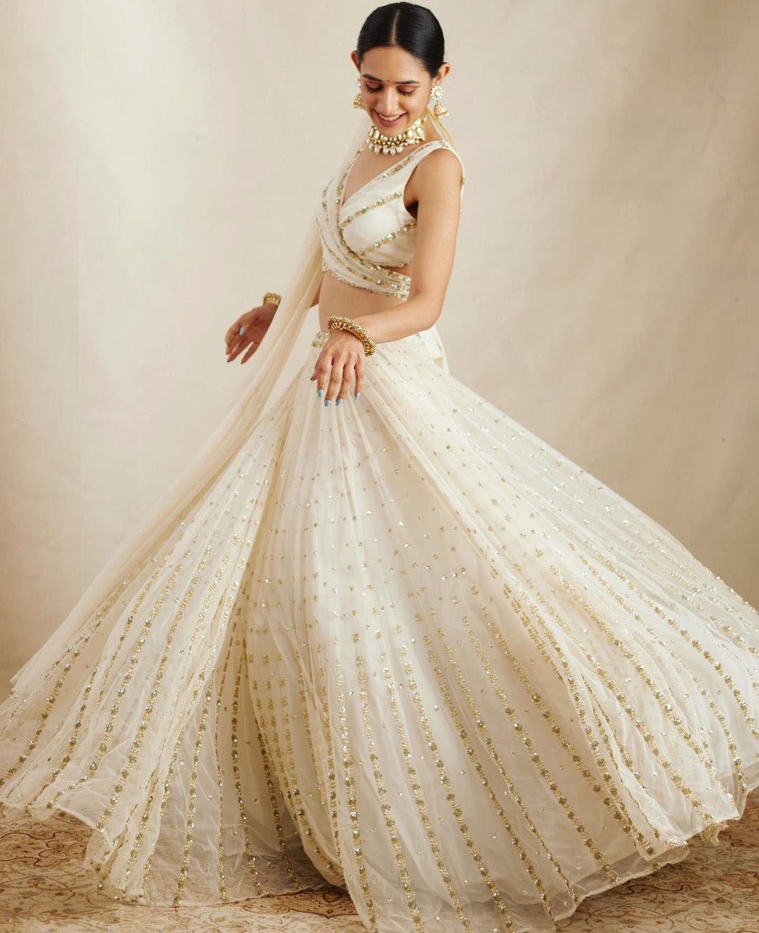 Gorgeous Georgette Off White Lehenga Choli Dupatta Set with Jari Embroidery