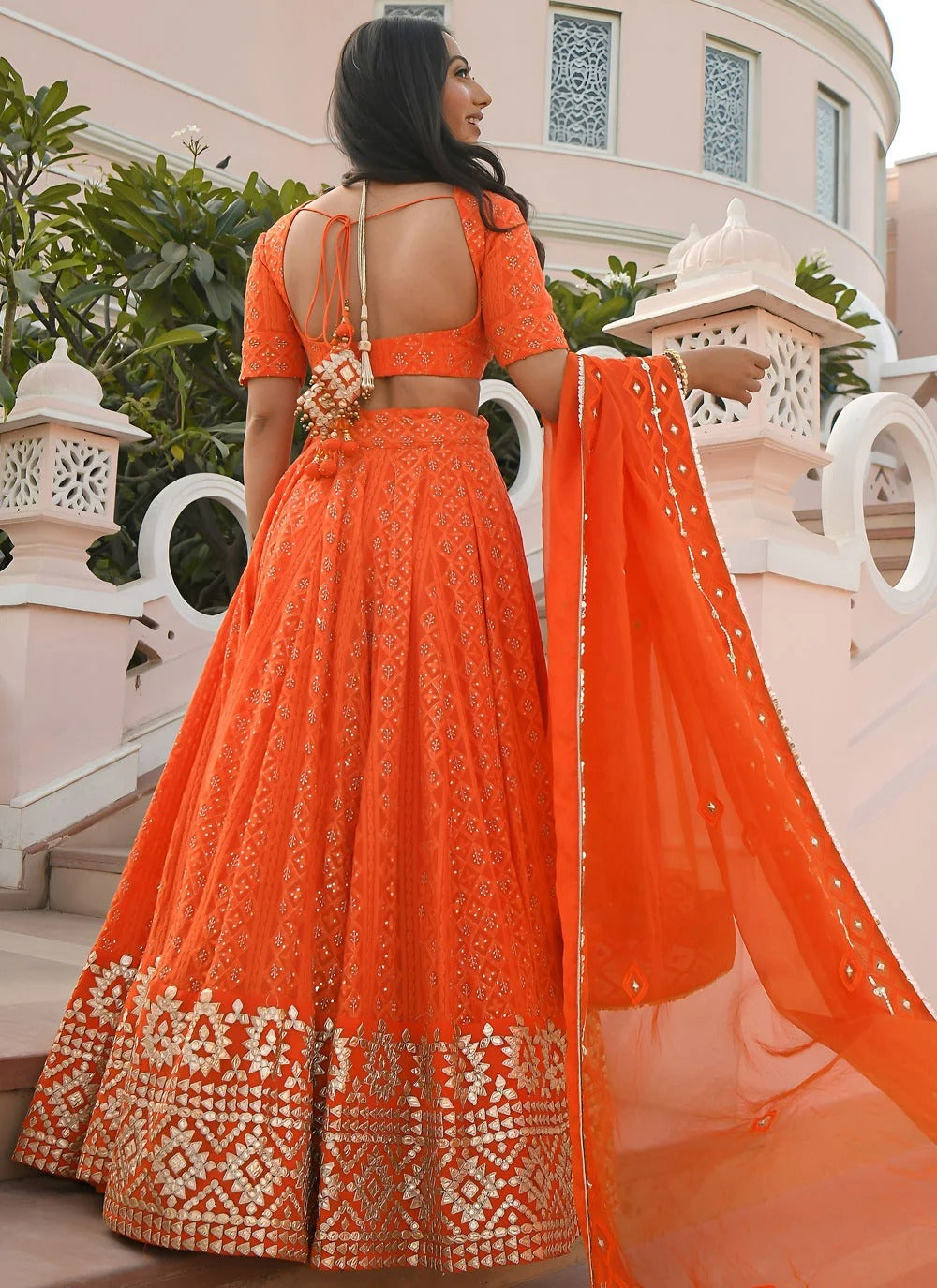 Orange bridesmaid lehenga in georgette with gota patti embroidery