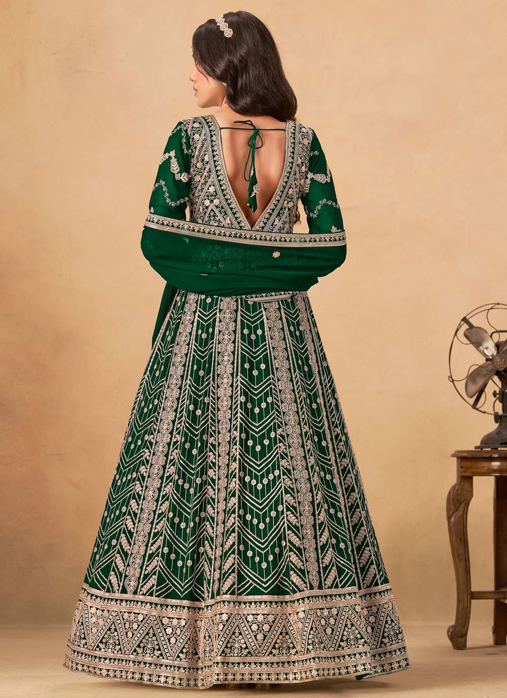 Graceful green faux georgette abaya style suit with full embroidery