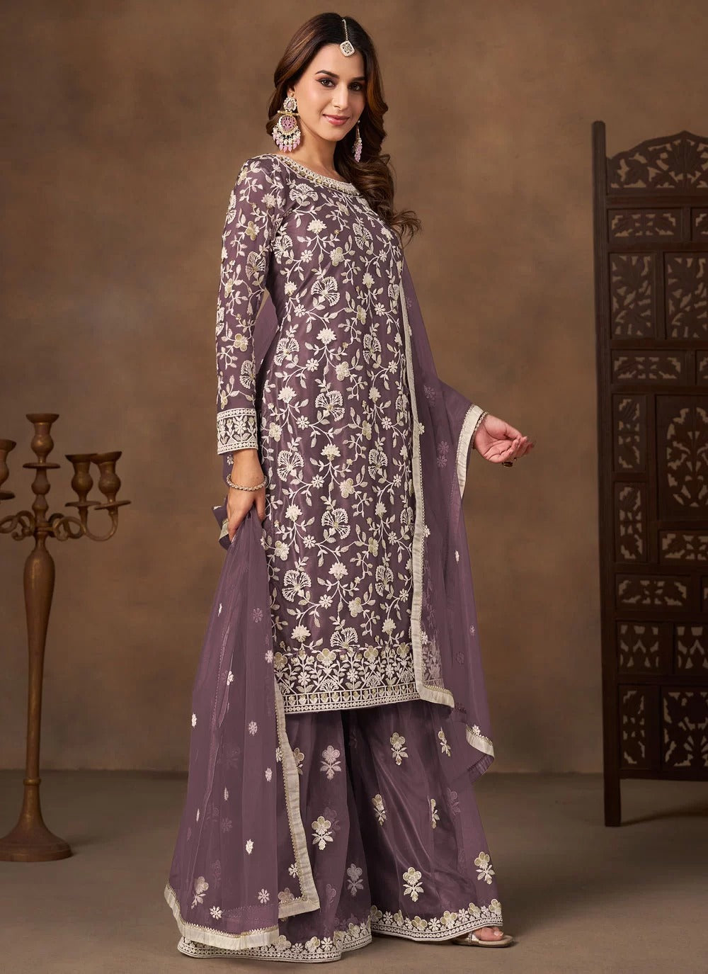 Graceful lavender net embroidered palazzo salwar suit with satin inner