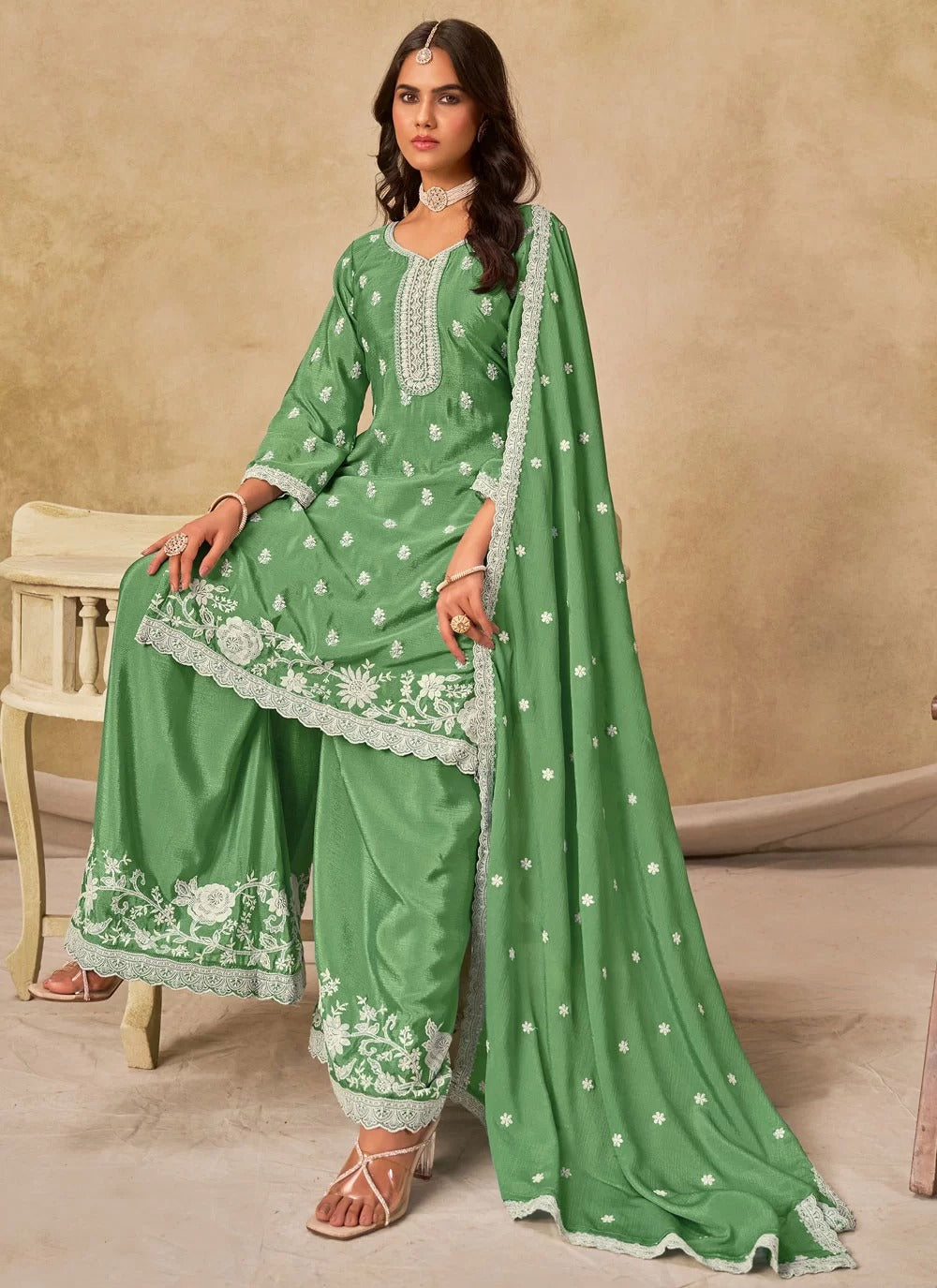 Gorgeous green chinnon silk embroidered palazzo salwar suit