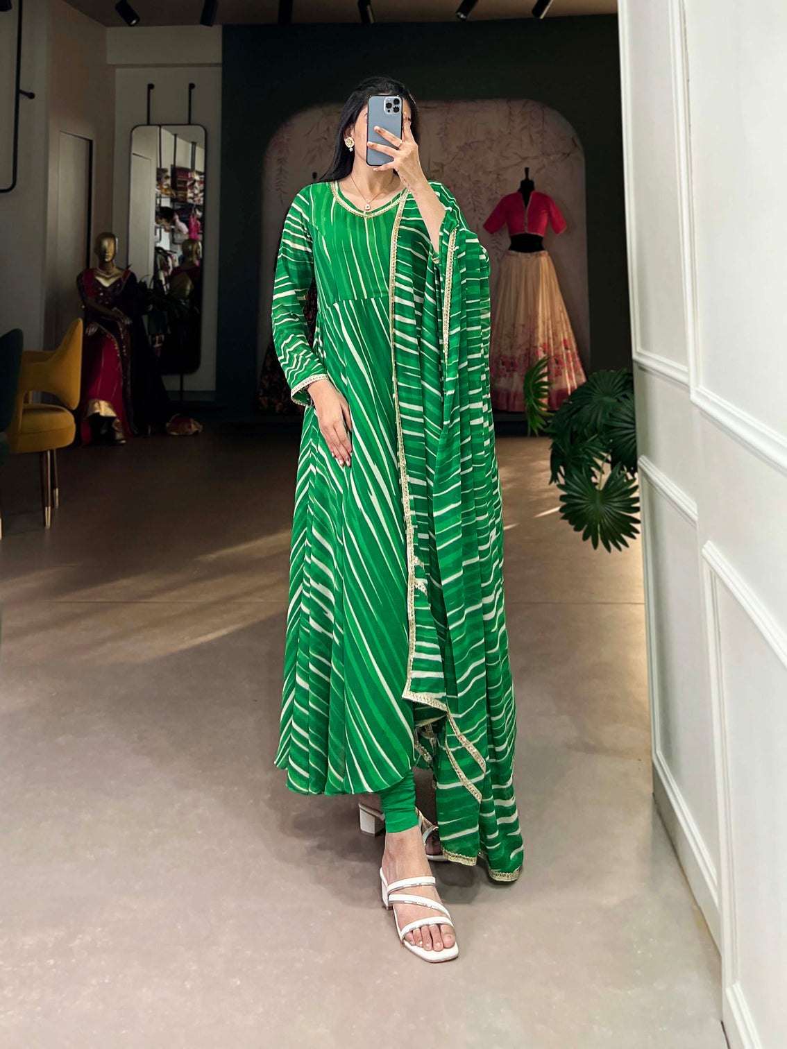 Green color leheriya with lace touch up georgette gown