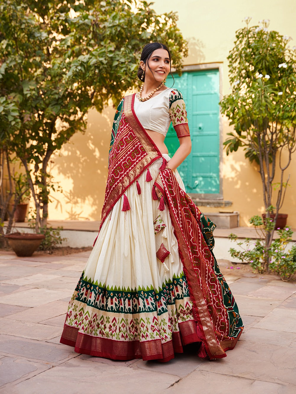 Green Color Patola Print Tussar Silk Lehenga Choli with Foil Detailing