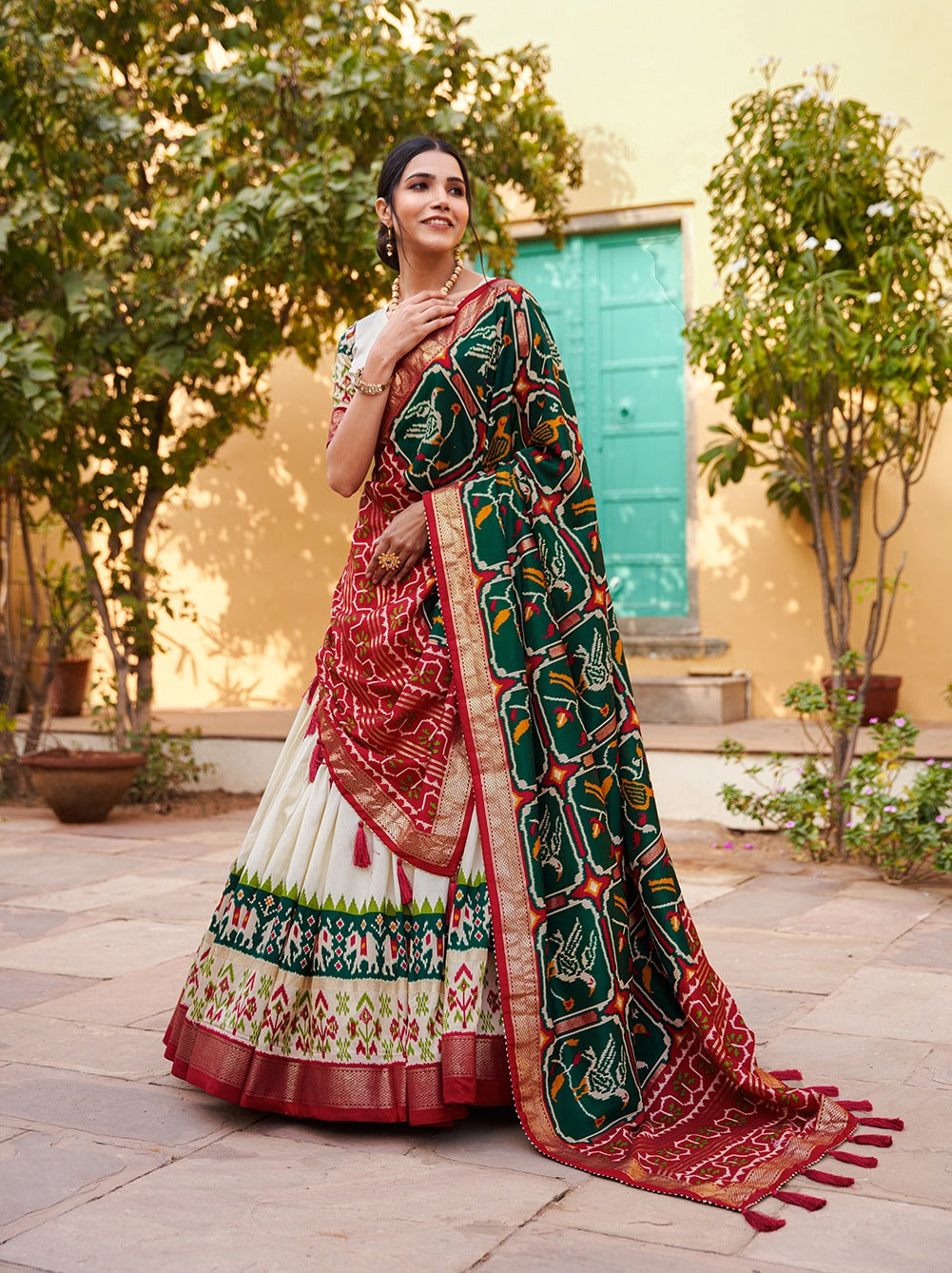 Green Color Patola Print Tussar Silk Lehenga Choli with Foil Detailing
