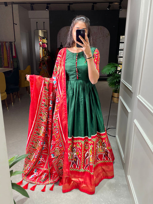 Green Color Patola And Foil Printed Dola Silk Gown