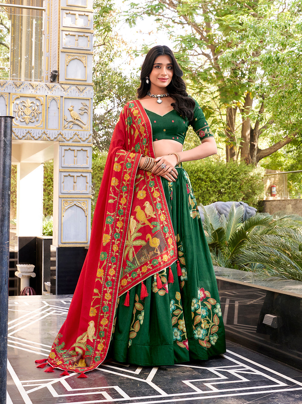 Emerald green tussar silk lehenga choli with foil print lace accents matching dupatta