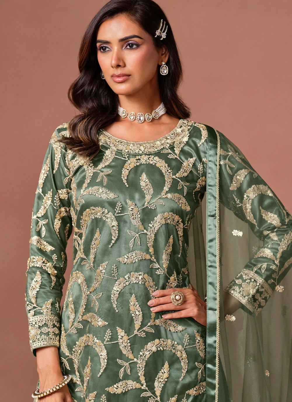 Green embroidered palazzo suit set with sequins zari work