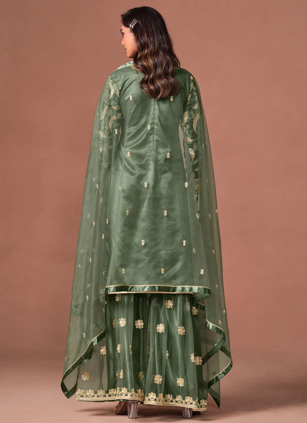 Green embroidered palazzo suit set with sequins zari work