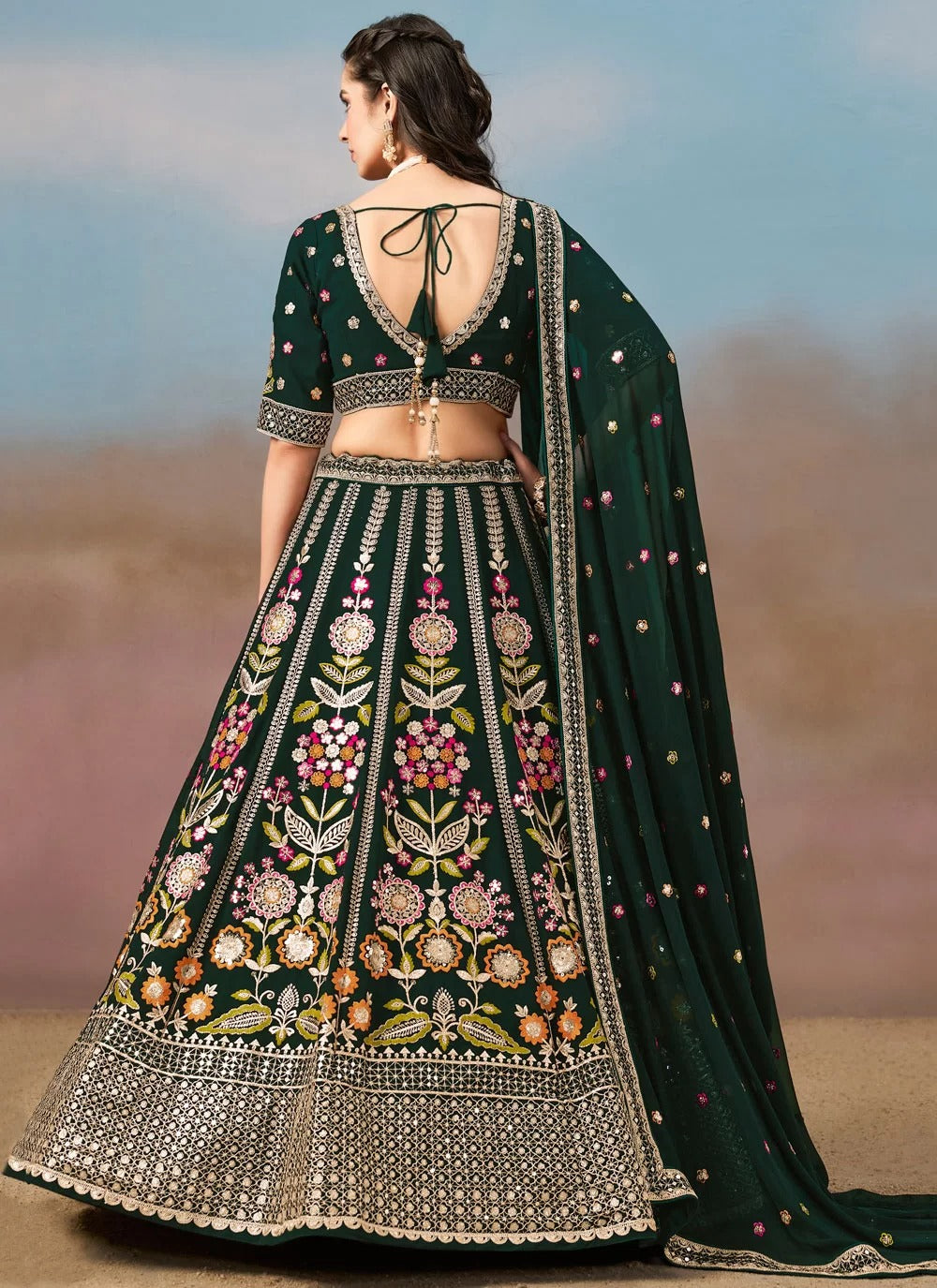Majestic green georgette reception wear lehenga with sequins zari multicolor embroidery