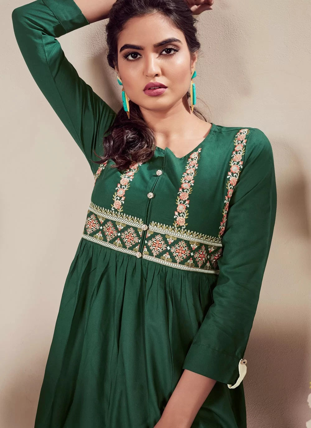 Green heavy reyon embroidered short tunic top for women