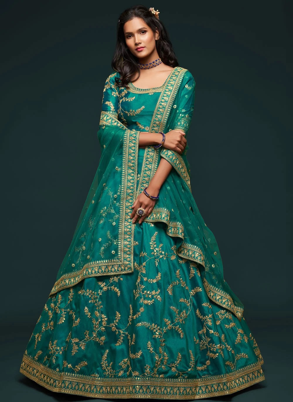Green heavy zari and sequins embroidery work lehenga