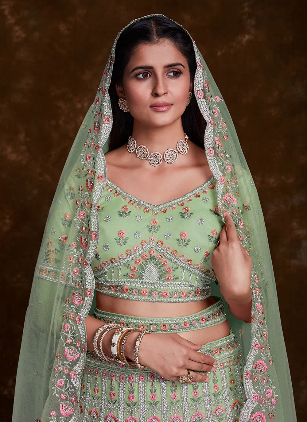 Green Net Zarkan and Thread designer bridal lehenga
