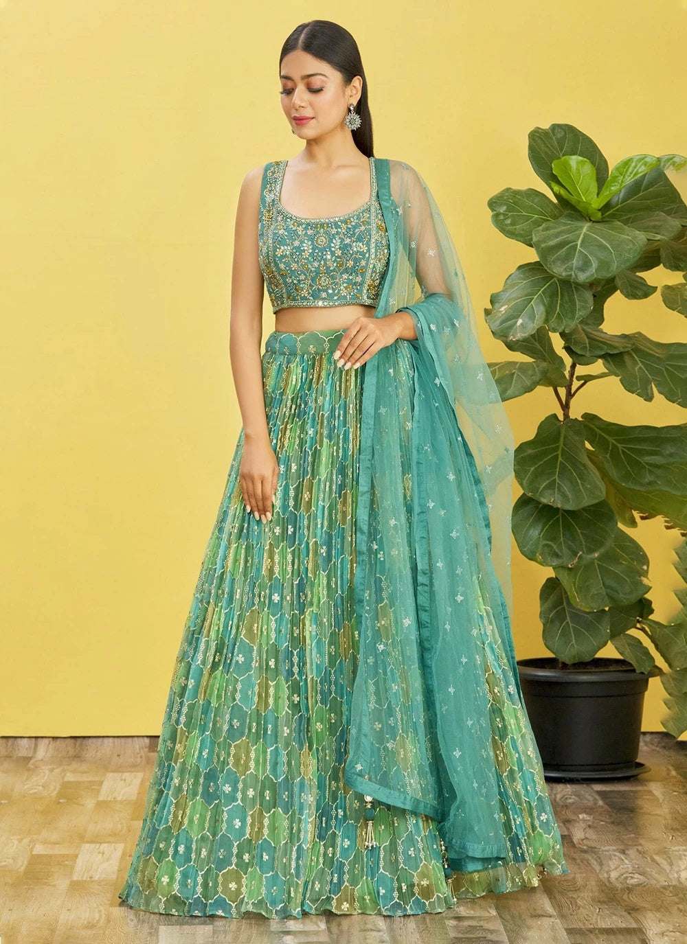 Green organza mirror and sequins work party wear lehenga