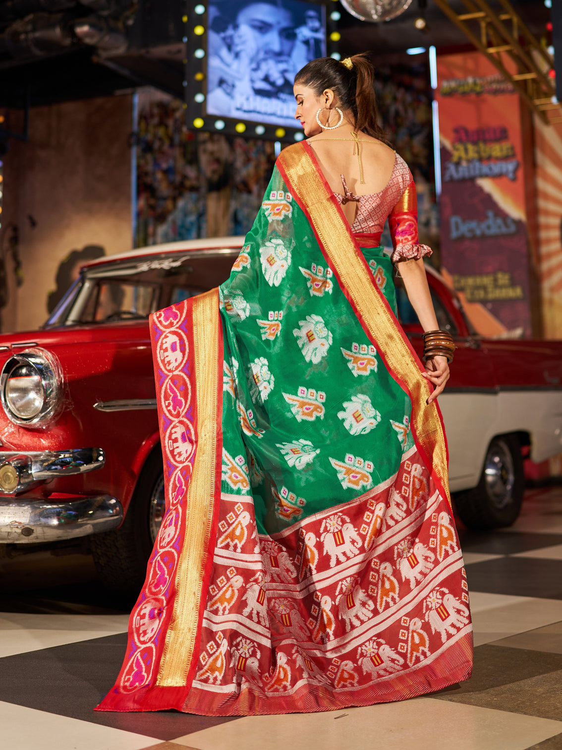 Enchanting Green Patola Silk Saree with Exquisite Weaving Work