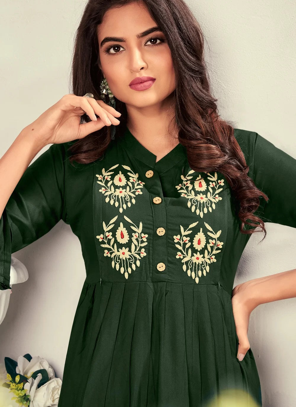 Green rayon kurti with intricate embroidery and feeding functionality