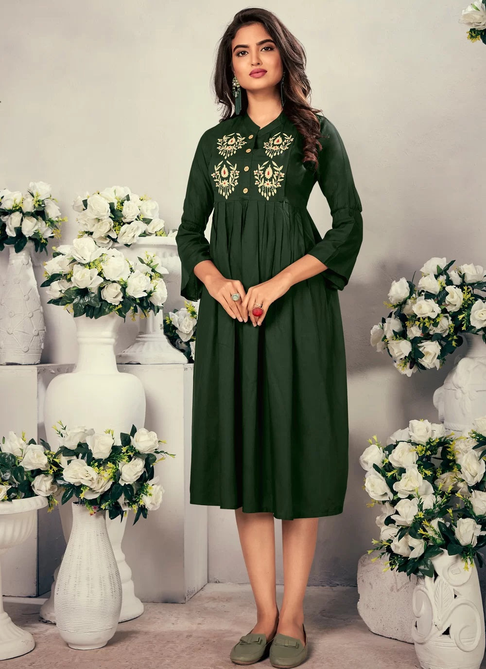Green rayon kurti with intricate embroidery and feeding functionality