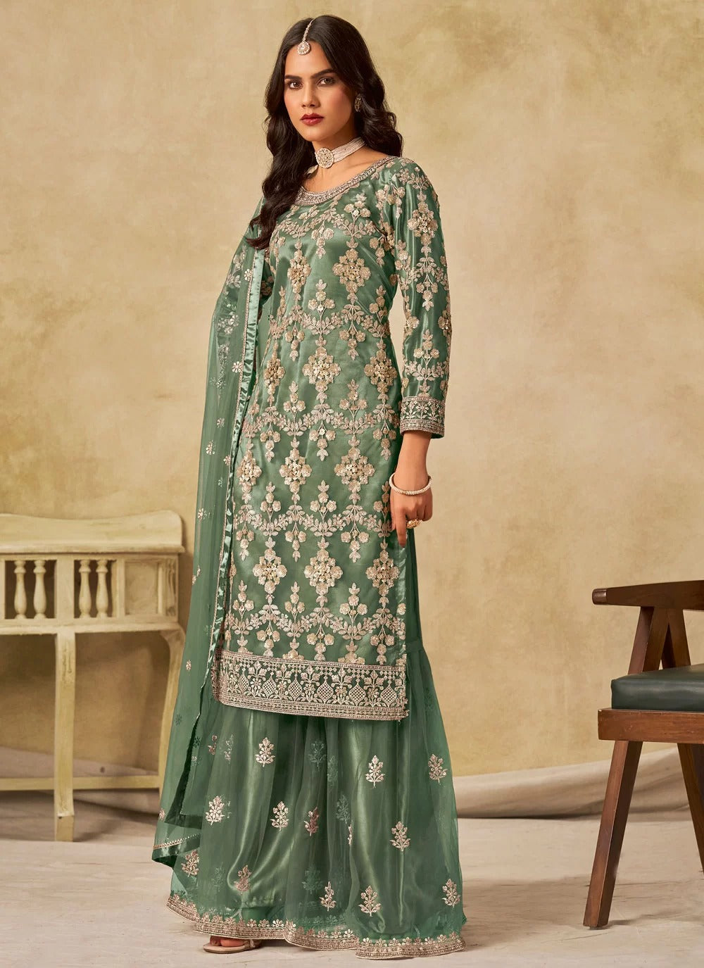 Gorgeous green sequins embroidered net sharara suit with satin inner