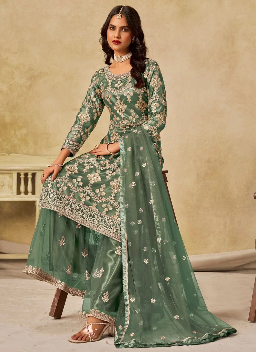 Gorgeous green sequins embroidered net sharara suit with satin inner