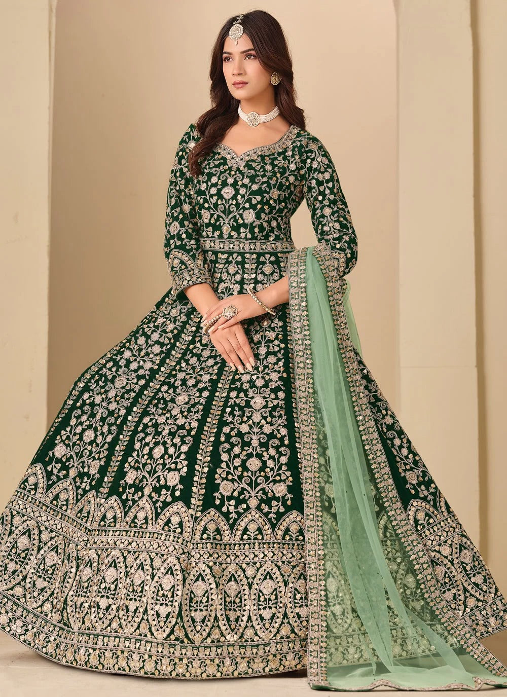 Embroidered green velvet abaya style anarkali suit with net dupatta