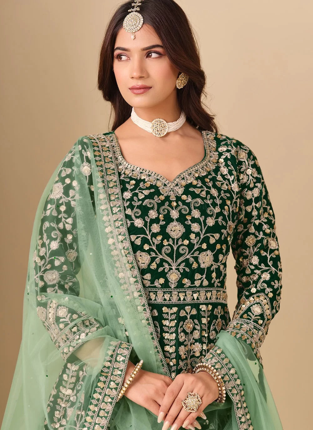 Embroidered green velvet abaya style anarkali suit with net dupatta