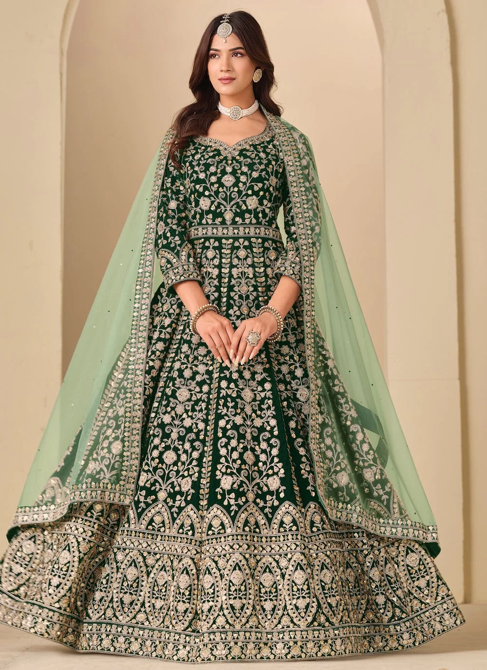 Embroidered green velvet abaya style anarkali suit with net dupatta
