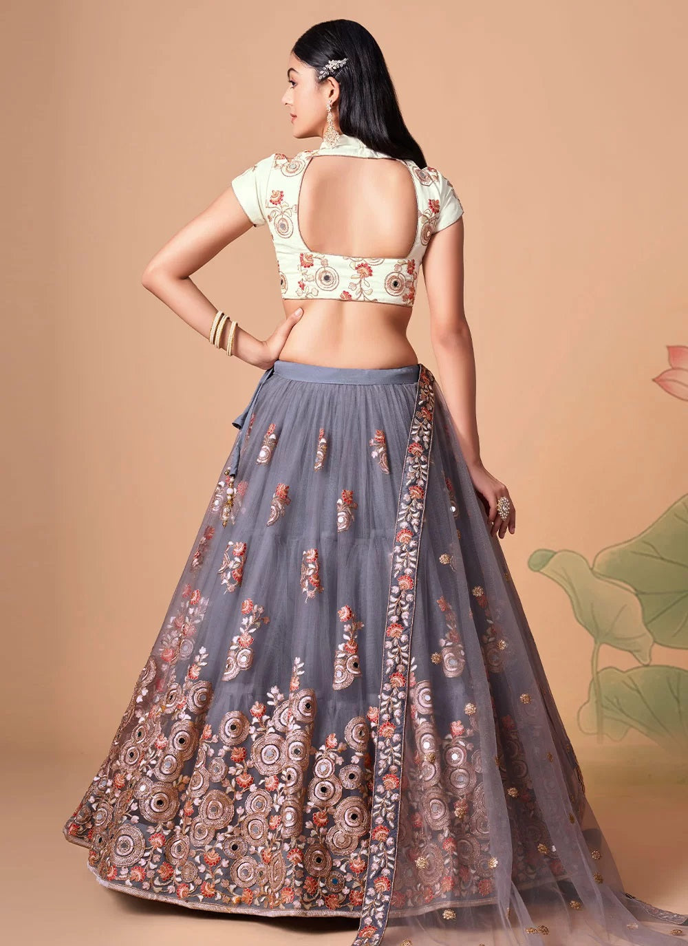 Grey color chic net lehenga with stunning zari and thread work