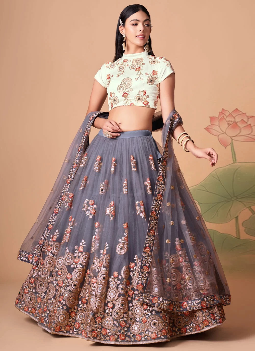 Grey color chic net lehenga with stunning zari and thread work