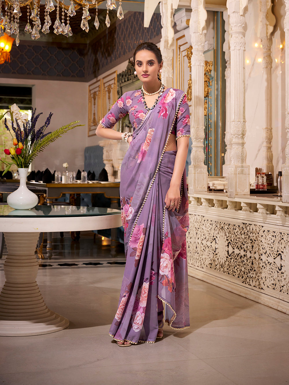 Grey georgette printed saree with pearl lace border