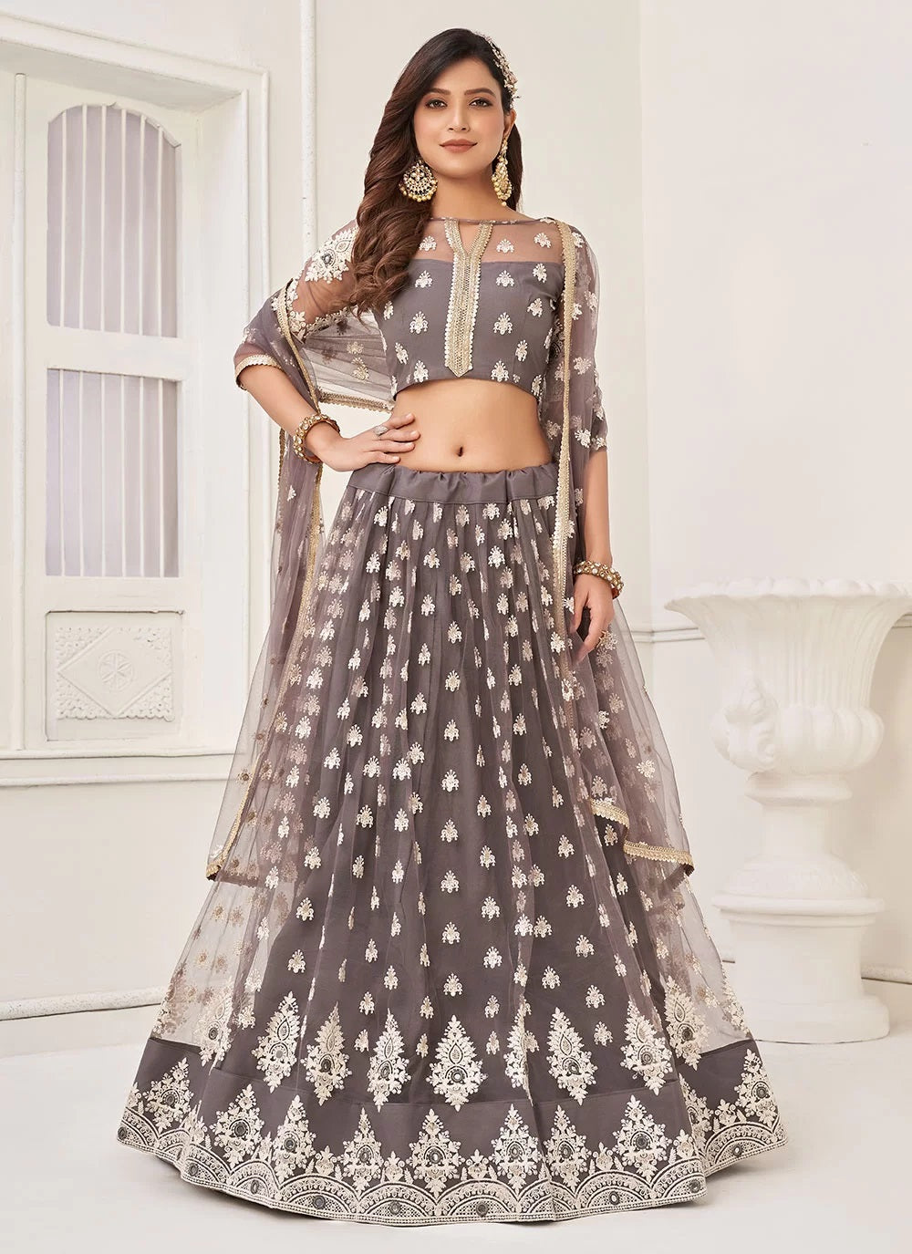 Grey color sequins thread embroidery lehenga in net